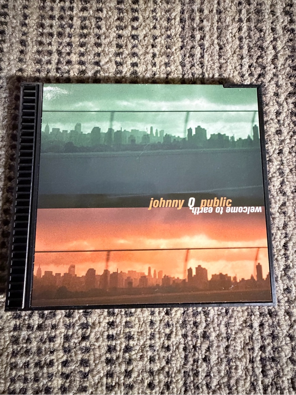 Johnny Q Public "Welcome to Earth" CD — Green & Orange Skyline